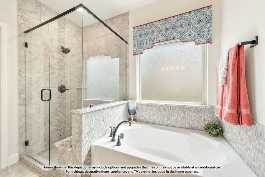 Bathroom with soaking tub, glass-enclosed tile shower, mosaic tile surround, and frosted privacy window