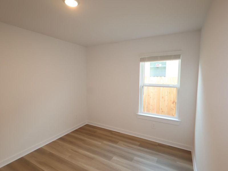 Spacious, unfurnished interior of a new home in Lone Star Landing, Montgomery (Image 17).