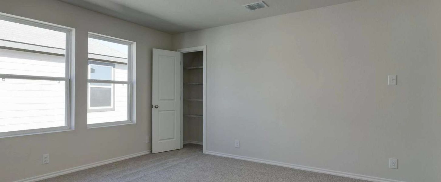 Representative unfurnished interior of a home built from the Placid by Ashton Woods in Hennersby Hollow, San Antonio (Image 17).