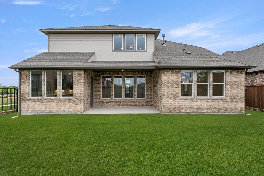 Exterior details and patio area of a home in Nelson Lake Estates, Rockwall (Image 22).