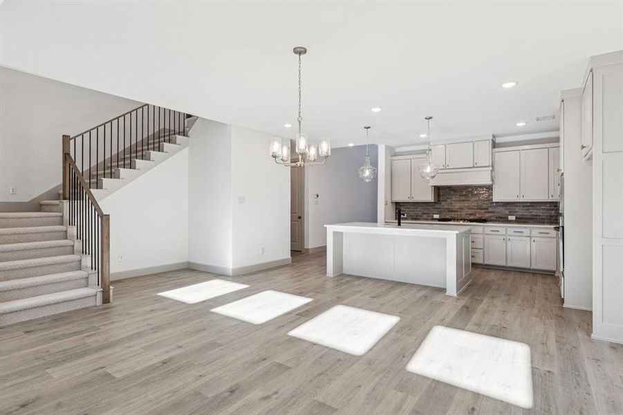 Open, flowing and beautifully finished, this dream kitchen is waiting for you to call it your own! Open, flowing and beautifully finished, this dream kitchen is waiting for you to call it your own!