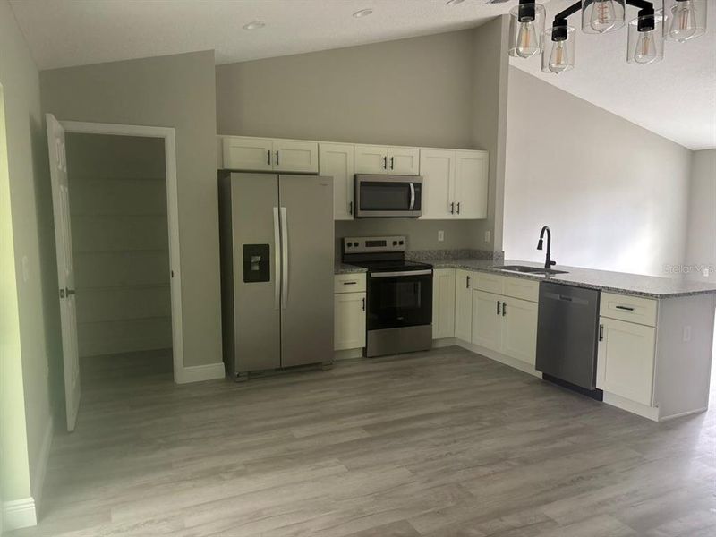 Furnished interior view inside a new home in , Dunnellon (Image 7).