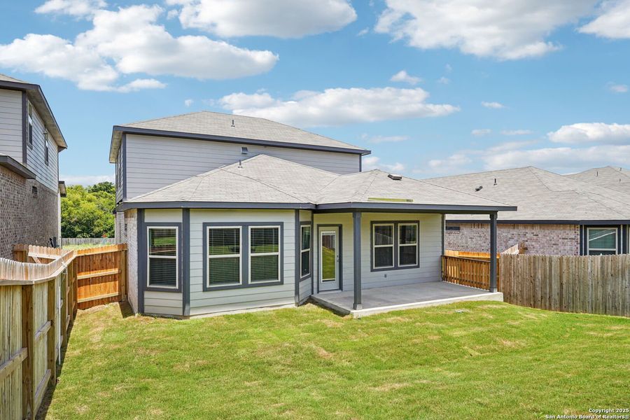 Front exterior of a new home in Comanche Ridge, San Antonio, TX, highlighting curb appeal (Image 2). Front exterior of a new home in Comanche Ridge, San Antonio, TX, highlighting curb appeal (Image 2).
