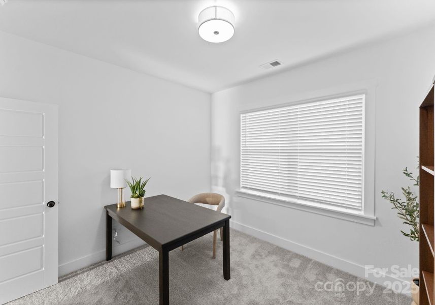 Photo is of model home in community, finishes may vary