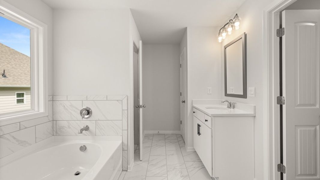 Representative furnished interior of a home built from the Grayson by D.R. Horton in Holland Estates, Powder Springs (Image 10).