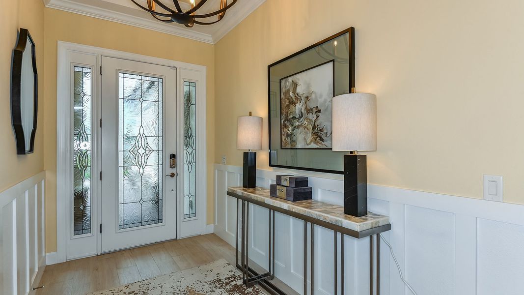Representative furnished interior of a home built from the Lazio 3 car by Taylor Morrison in Skye Ranch Community Group Page, Sarasota (Image 14).
