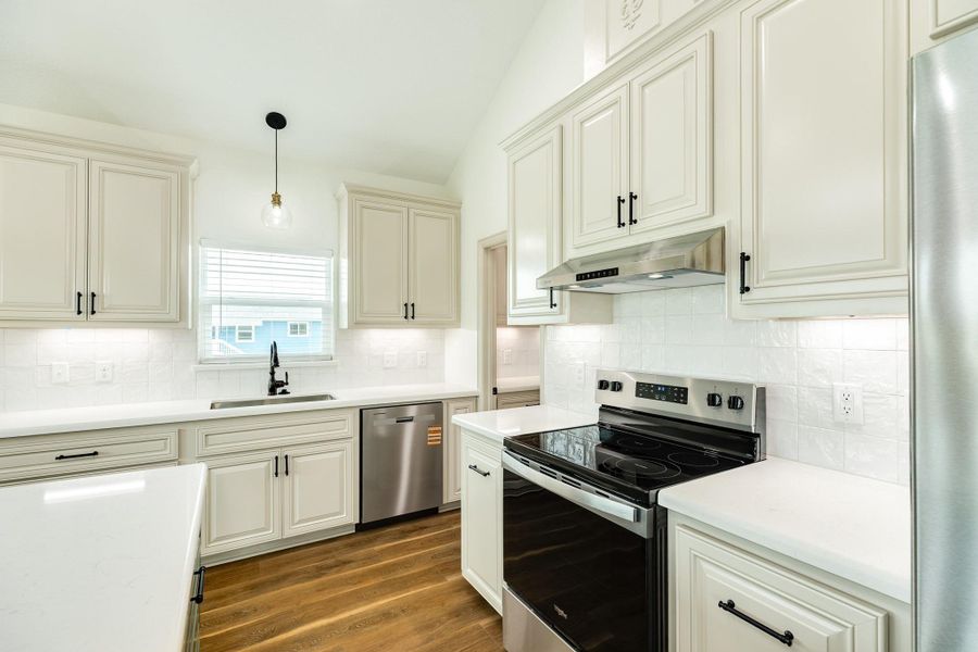 Furnished interior view inside a new home in , Oyster Creek (Image 5).