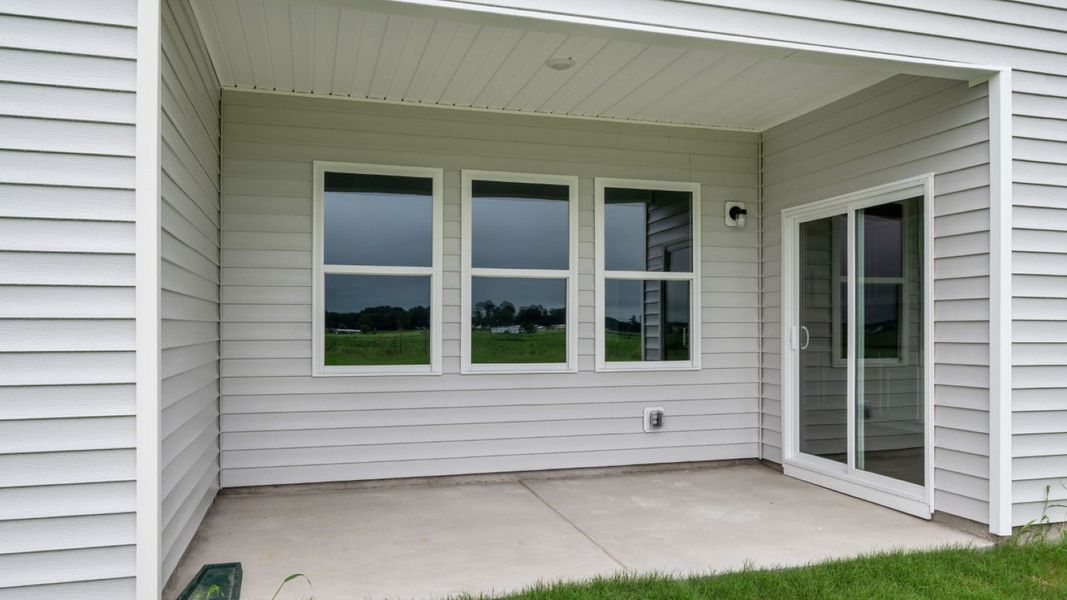 Front exterior of a new home in East Ridge, Ayden, NC, highlighting curb appeal (Image 17).