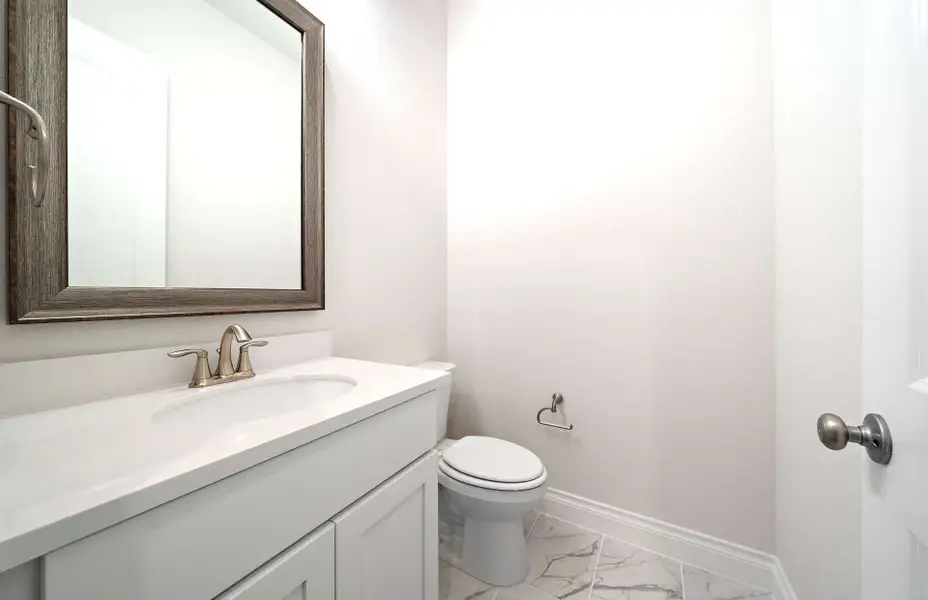 Representative furnished interior of a home built from the 3068 by Ravenna Homes in The Woodlands Hills 65′, Willis (Image 10).