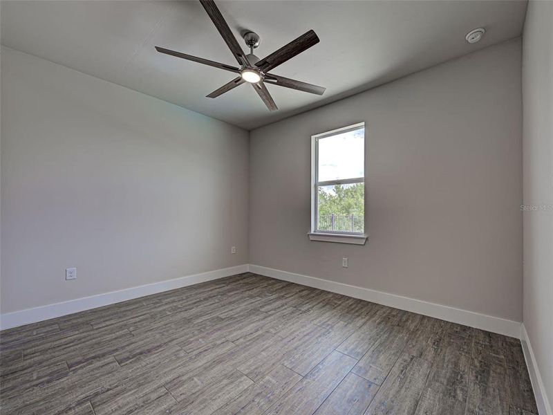 Spacious, unfurnished interior of a new home in , Port Charlotte (Image 46).