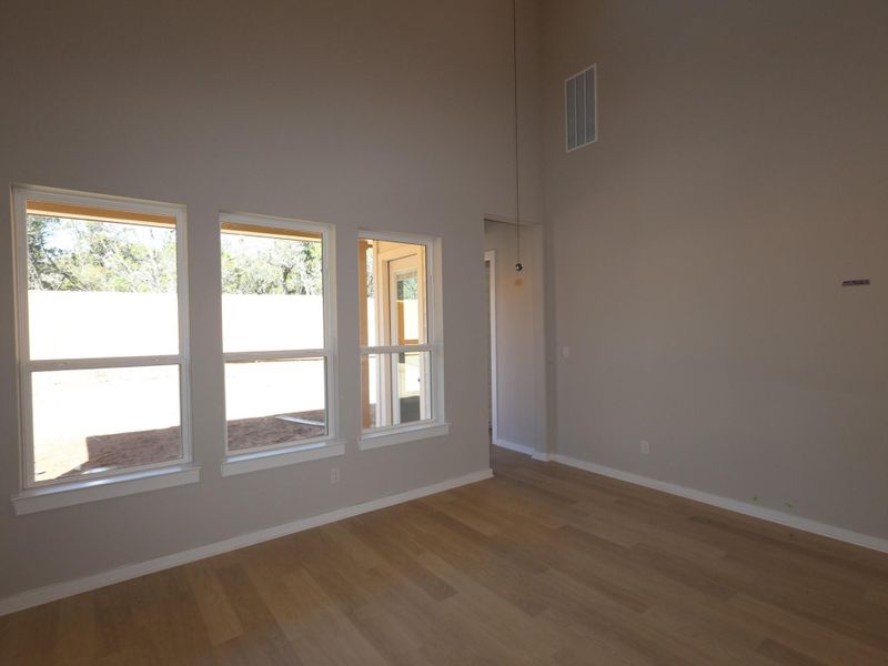 Spacious, unfurnished interior of a new home in Heritage, Dripping Springs (Image 21).