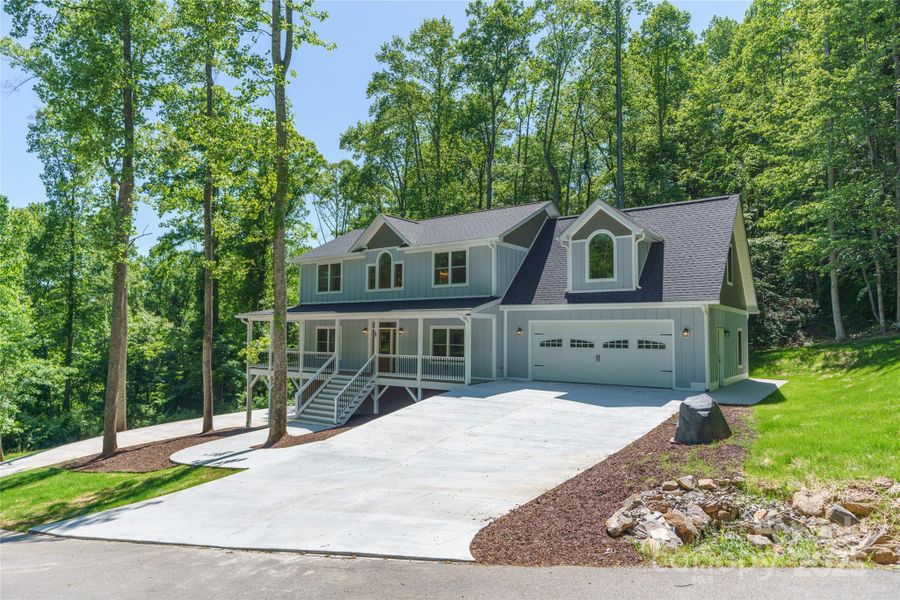Ample parking and room for an RV garage at the top of the left driveway