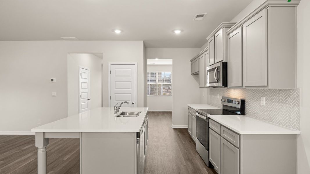 Representative furnished interior of a home built from the ANSLEY Express by D.R. Horton in WillowBrook, Winder (Image 10).
