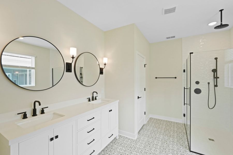 Primary bath with matte black finishes