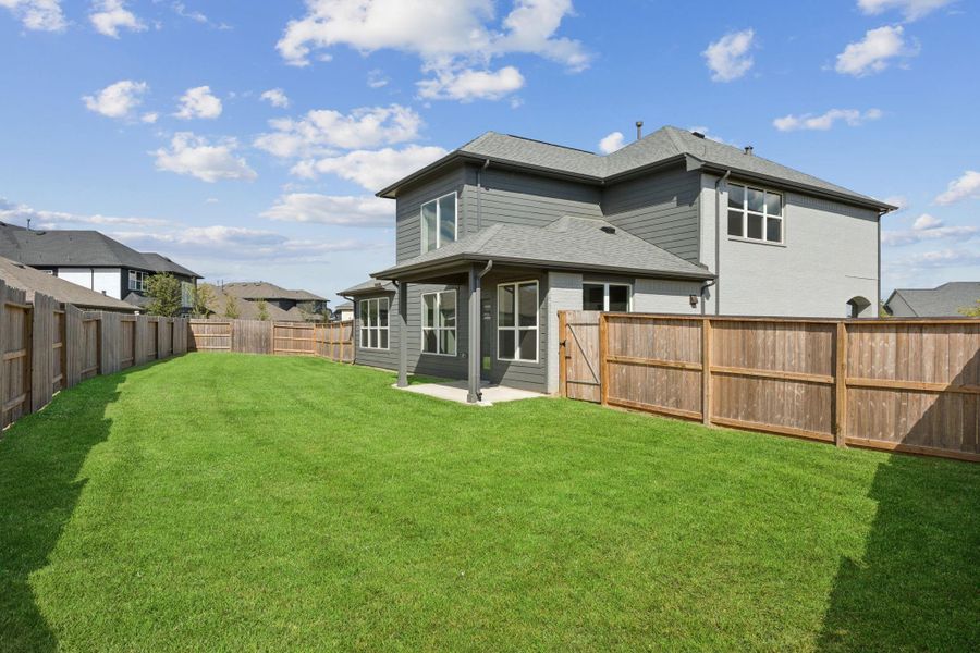 Exterior details and patio area of a home in Saint Tropez, Houston (Image 3). Exterior details and patio area of a home in Saint Tropez, Houston (Image 3).