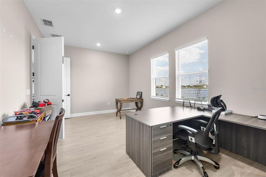 Furnished interior view inside a new home in Laureate Park, Orlando (Image 11).