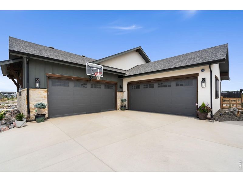 Front exterior of a new home in , Windsor, CO, highlighting curb appeal (Image 22).
