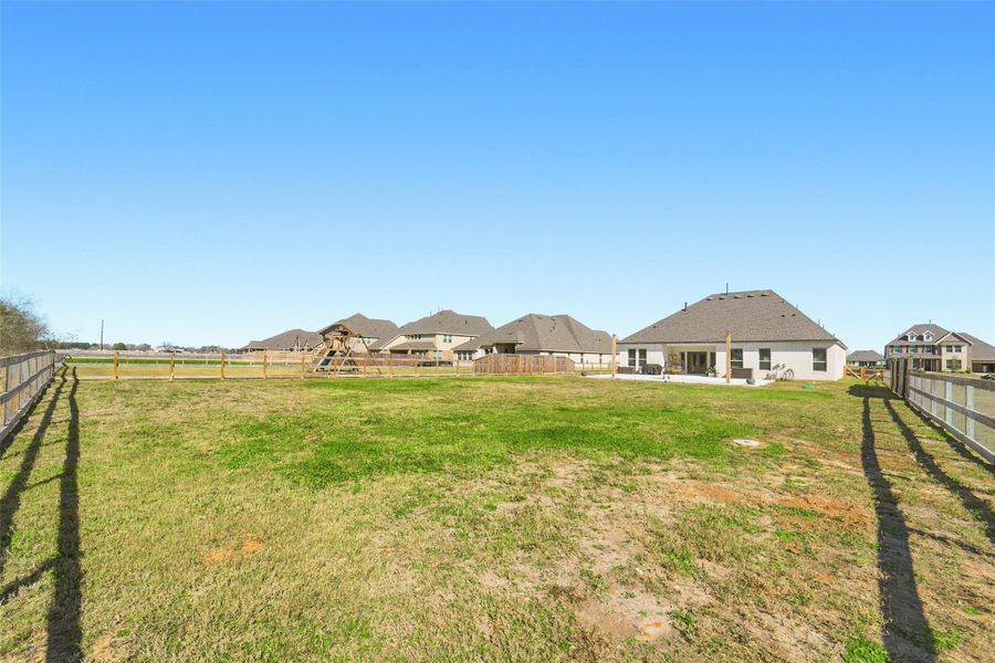 Exterior details and patio area of a home in Tejas Landing, Needville (Image 23).