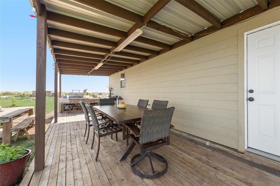 Wooden deck with outdoor dining space