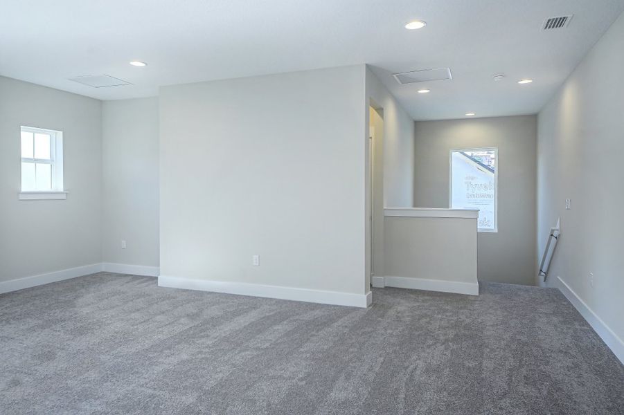 Representative unfurnished interior of a home built from the Julington by Riverside Homes in Hidden Creek at SilverLeaf 70' Series, St. Augustine (Image 35).