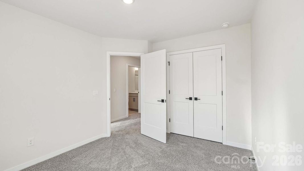 Spacious, unfurnished interior of a new home in The Townes at Lake Norman, Mooresville (Image 23).