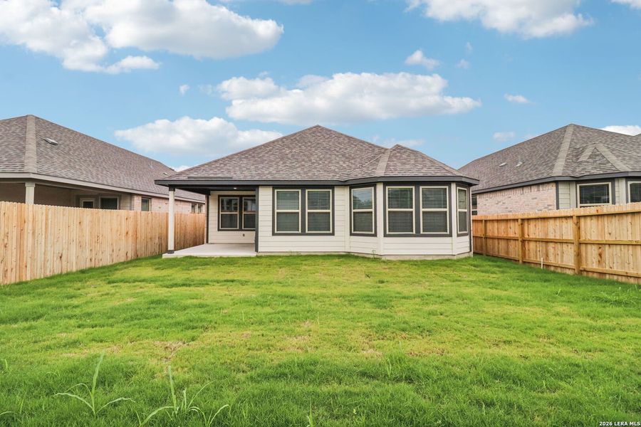 Exterior details and patio area of a home in Kallison Ranch, San Antonio (Image 32).
