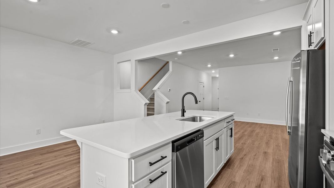 Exceptional culinary space with a striking 9-foot island