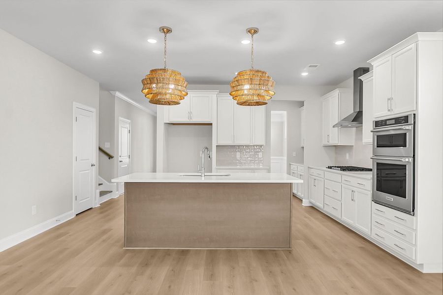 Furnished interior view inside a new home in Tidewater at Lakes of Cane Bay, Summerville (Image 16).