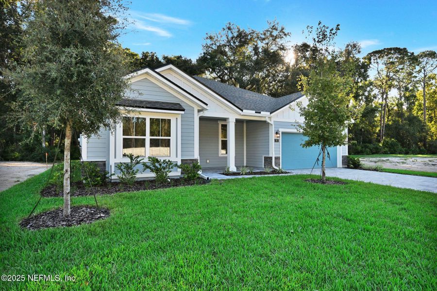 Exterior details and patio area of a home in Landing at Olde Florida, St. Augustine (Image 2).