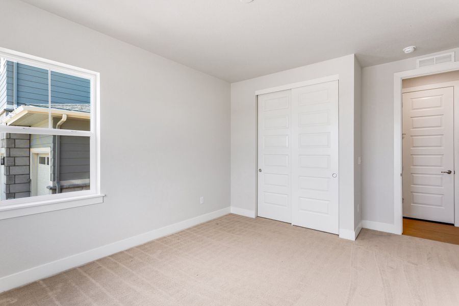 Spacious, unfurnished interior of a new home in The Aurora Highlands, Aurora (Image 21).