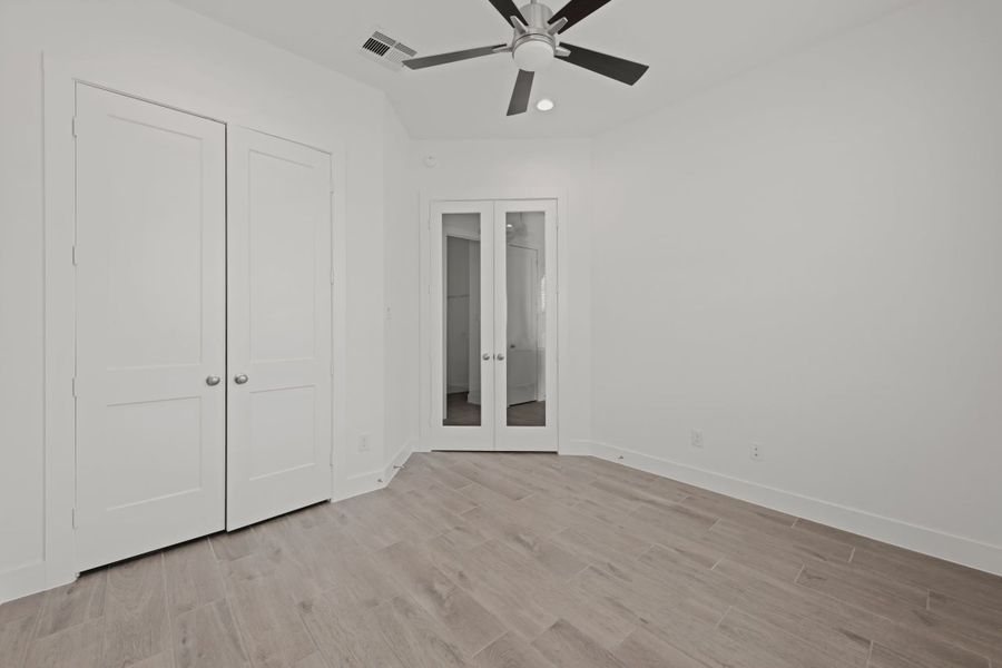 Representative unfurnished interior of a home built from the Rollins by Chesmar Homes in Gregg Ranch, Marble Falls (Image 11).