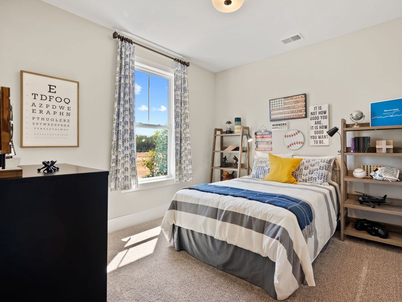 Representative furnished interior of a home built from the Riley P by True Homes in Homecoming, Ravenel (Image 12).