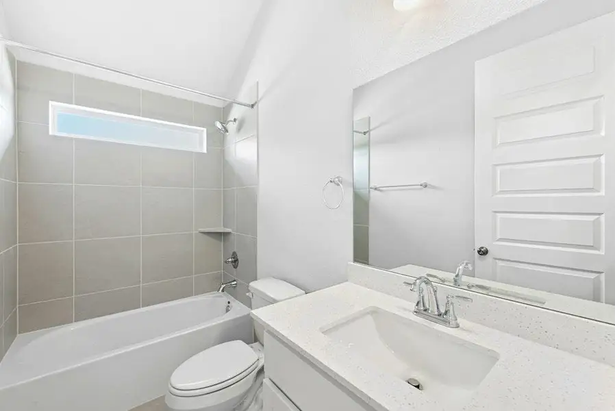 Furnished interior view inside a new home in The Colony, Bastrop (Image 6). Furnished interior view inside a new home in The Colony, Bastrop (Image 6).