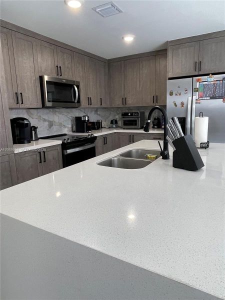 Furnished interior view inside a new home in , Florida City (Image 17).