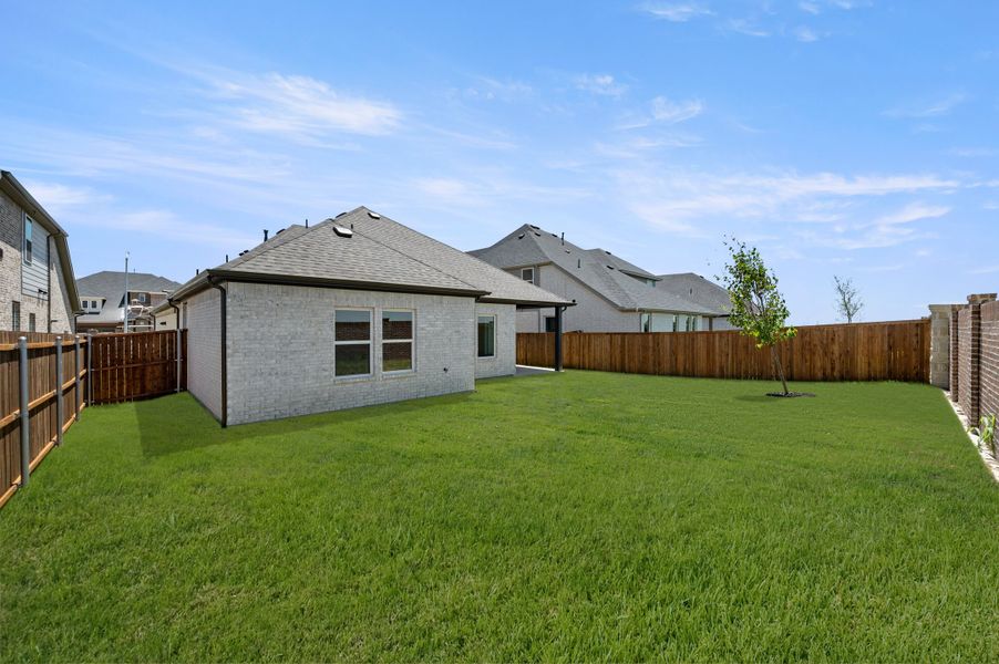 Exterior details and patio area of a home in Wildflower Ranch, Fort Worth (Image 4).