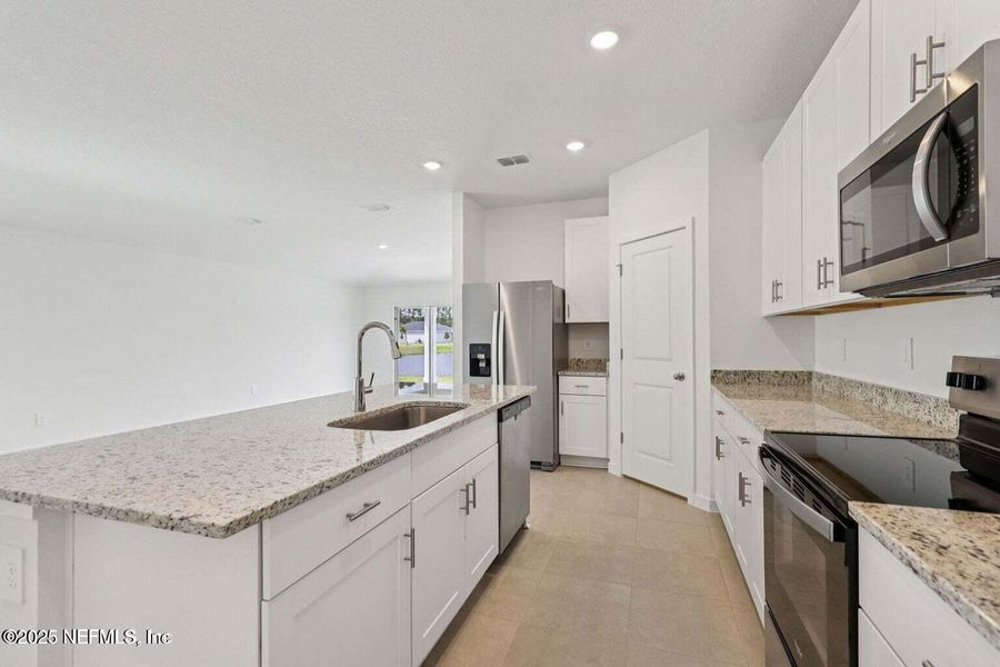 Furnished interior view inside a new home in Azalea Creek, Jacksonville (Image 10).