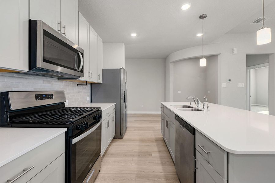 Furnished interior view inside a new home in Sundance Cove - Premier Series, Crosby (Image 18).