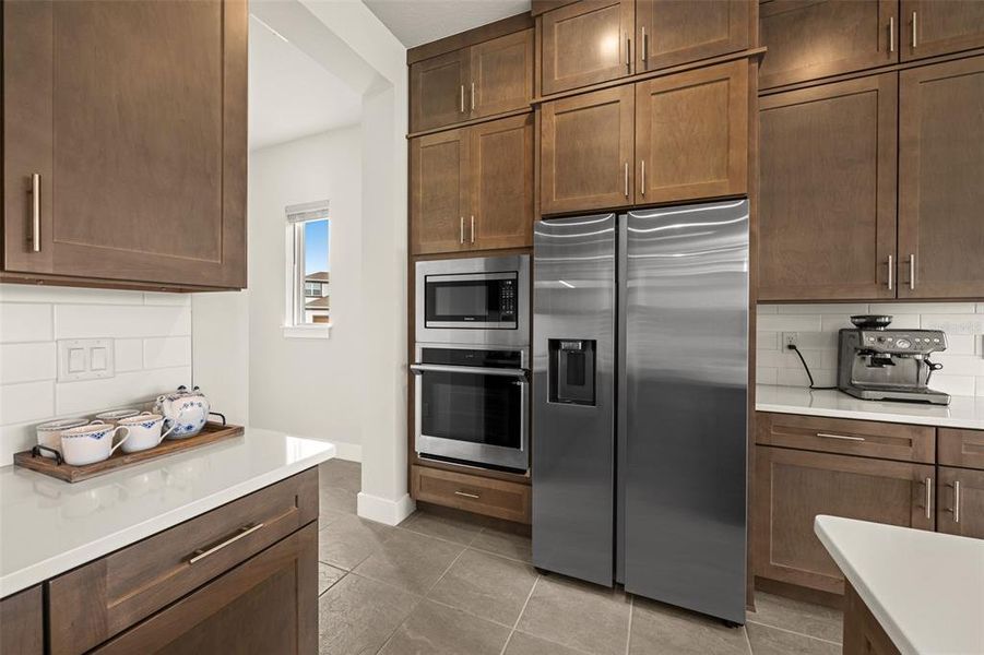 Furnished interior view inside a new home in Robin's Cove at Epperson, Wesley Chapel (Image 32).