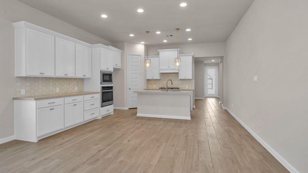 Furnished interior view inside a new home in Meridiana, Manvel (Image 4).