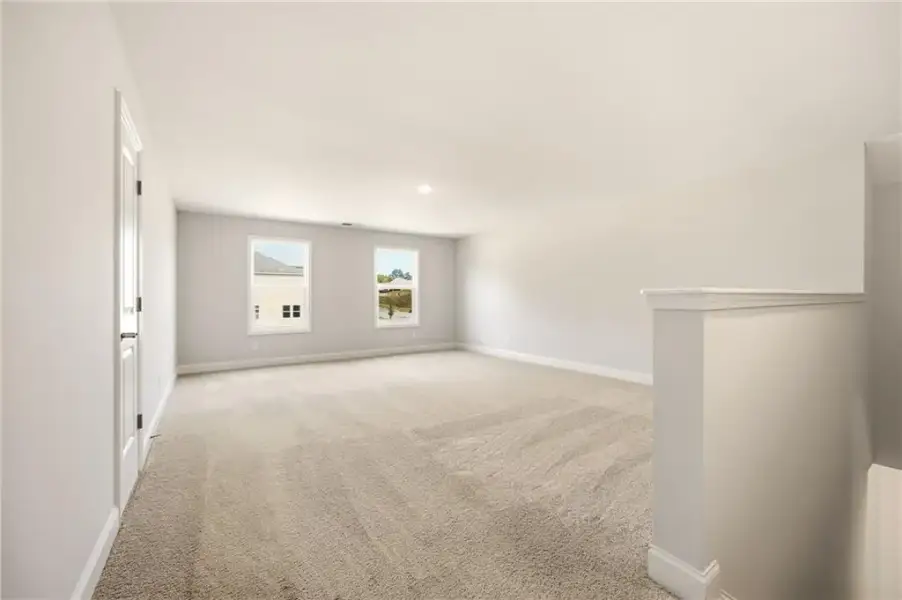 Spacious, unfurnished interior of a new home in Heritage Pointe at The Georgian, Villa Rica (Image 21). Spacious, unfurnished interior of a new home in Heritage Pointe at The Georgian, Villa Rica (Image 21).