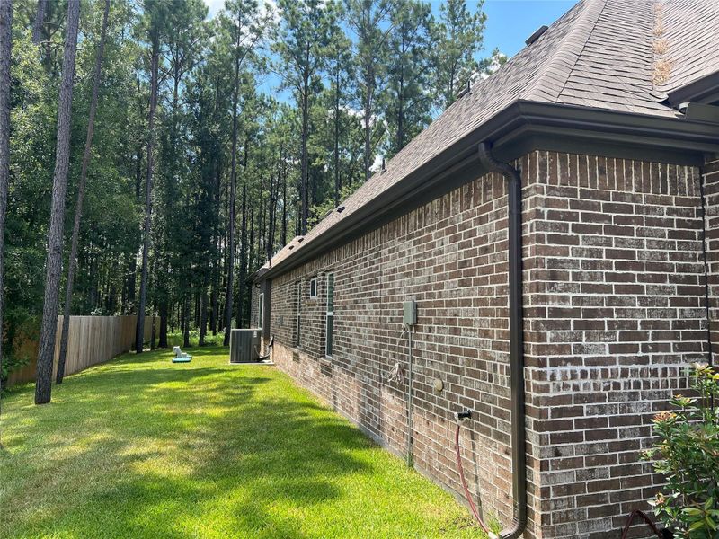 Exterior details and patio area of a home in , Conroe (Image 4). Exterior details and patio area of a home in , Conroe (Image 4).