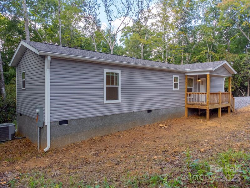 Exterior details and patio area of a home in , Hayesville (Image 29).