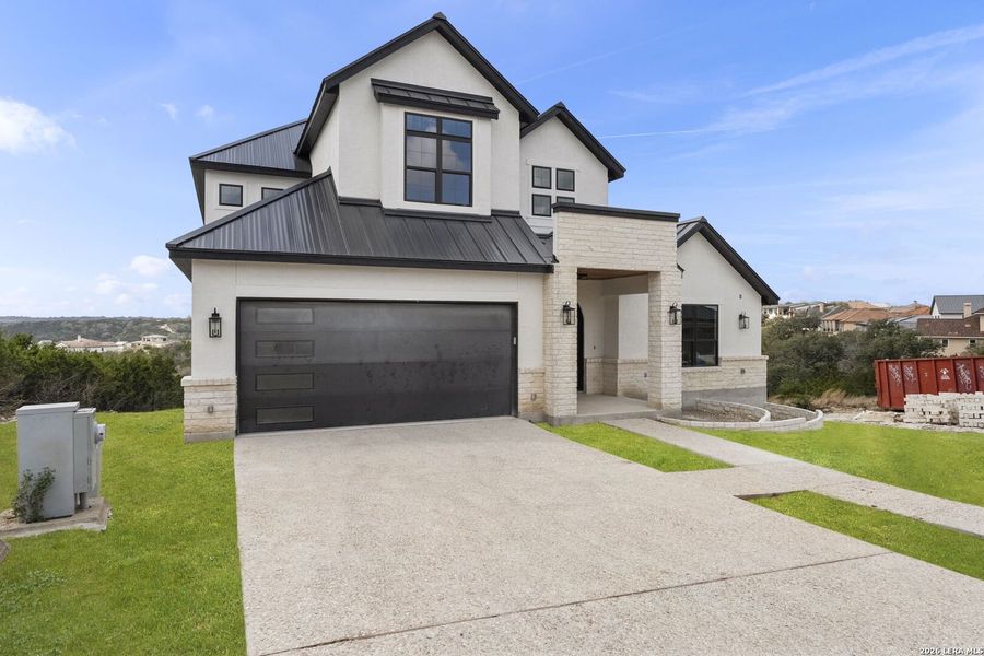 Front exterior of a new home in , Boerne, TX, highlighting curb appeal (Image 23).