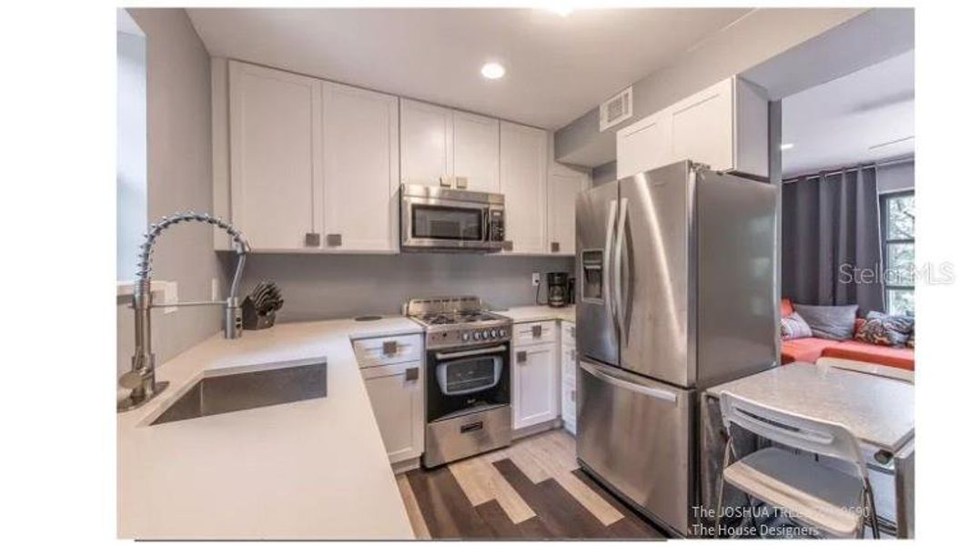 Furnished interior view inside a new home in , Punta Gorda (Image 13).