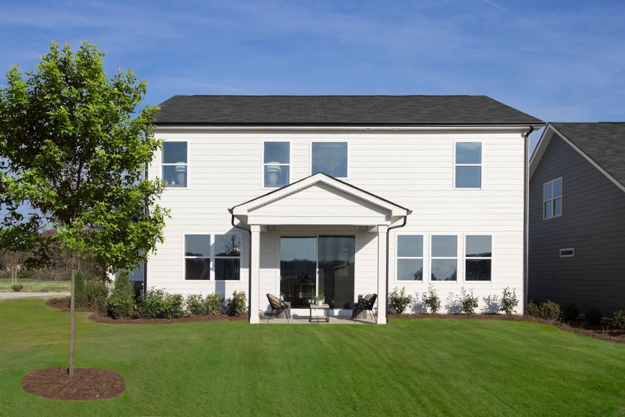 Sequoia model exterior back with covered veranda. Sequoia model exterior back with covered veranda.