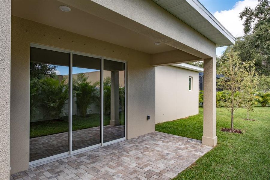Exterior details and patio area of a home in , Palm Harbor (Image 26).