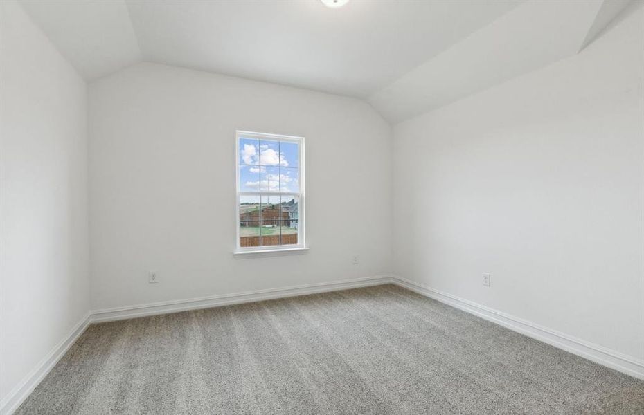 Spacious secondary bedroom with ample closet space*real home pictured