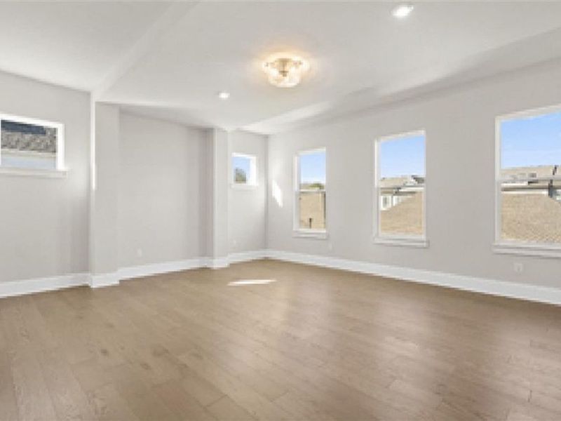 Spacious, unfurnished interior of a new home in The Village at Towne Lake, Woodstock (Image 45).