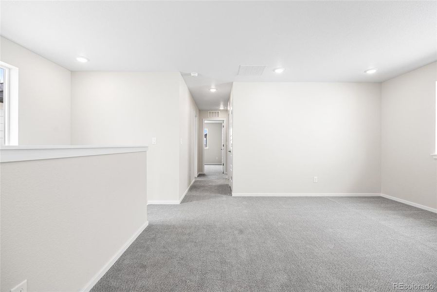 Spacious, unfurnished interior of a new home in Barefoot Village, Firestone (Image 15).