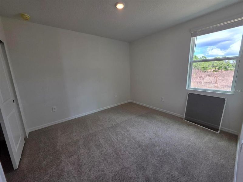 Spacious, unfurnished interior of a new home in Magnolia Bay - Classic Series, Nokomis (Image 8).